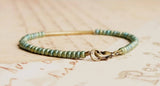 Metallic Green Seed Bead And Bronze Bar Bracelet