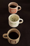 Sisis mug, Le cafè
